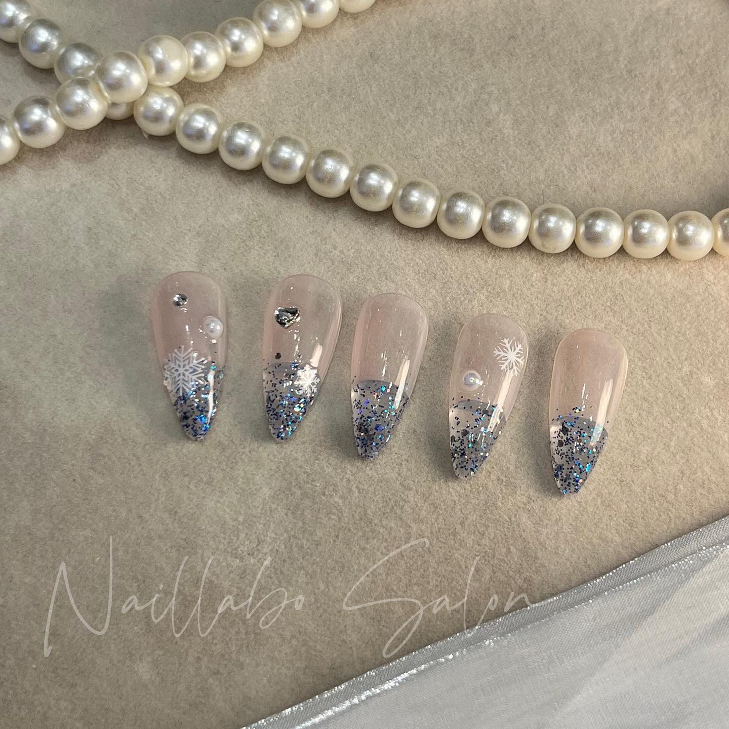 Snowflake Sparkle Almond Shaped Nails